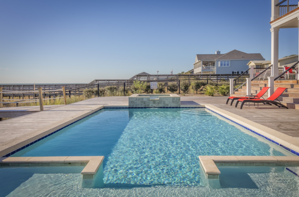 Aquatic recreation water-treatment — pool or wave-park clear water under blue sky